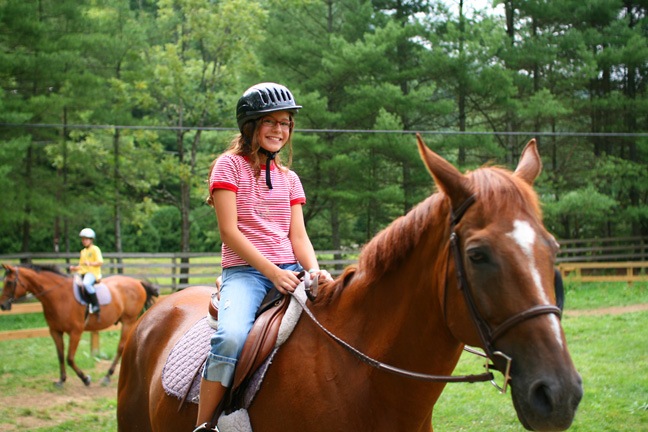 Girl Riding Horses