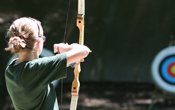 Archery camper pose