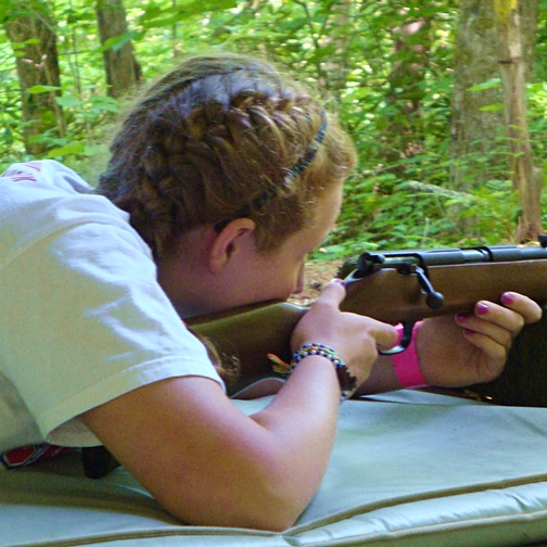 Camp Girl Shooting Rifle