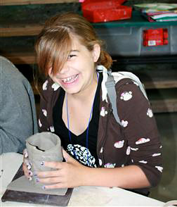 Rockbrook Girls Smiles at Pottery Activity