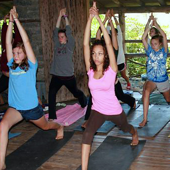 camp girls taking yoga class at Rockbrook