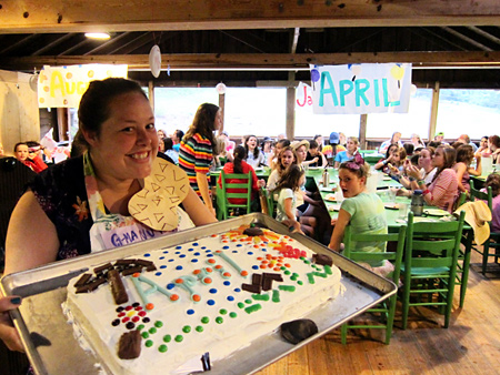 Birthday cake and excited camp girls