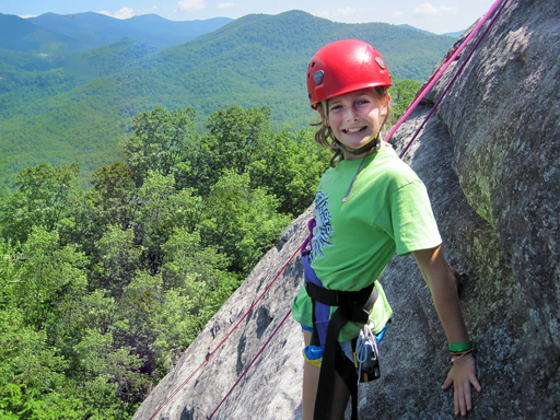 Rockbrook camper Joanna climbing looking glass rock