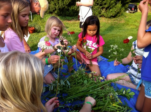 camp children picking flowers