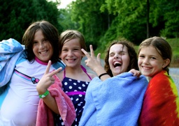 Camp girls giving peace sign