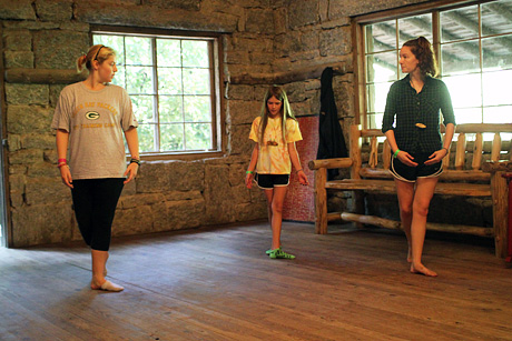Dance counselors teaching girl