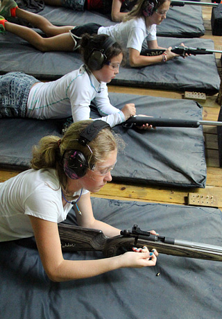 Girls Loading Rifles