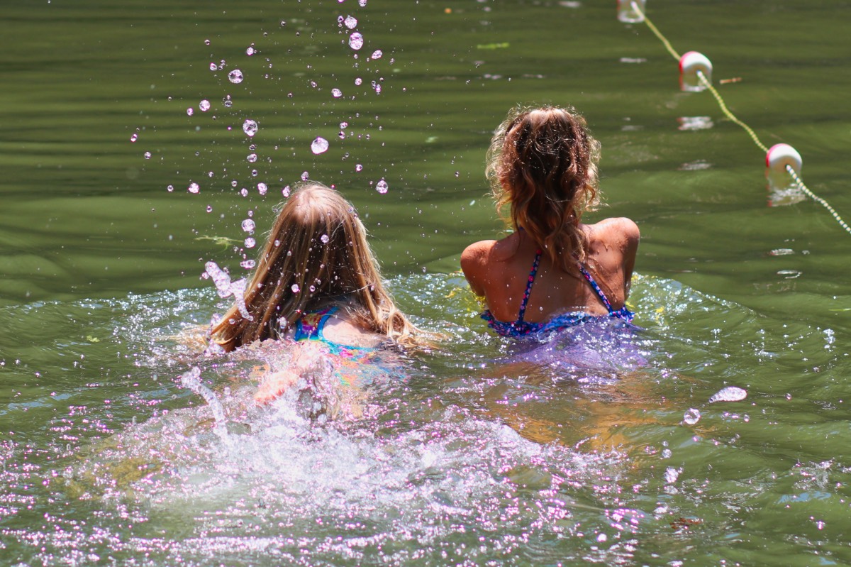 mermaid girls swimming laps