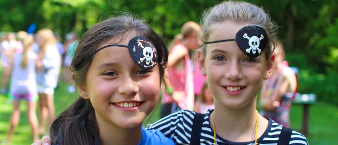 Summer camp girls dressed as pirates