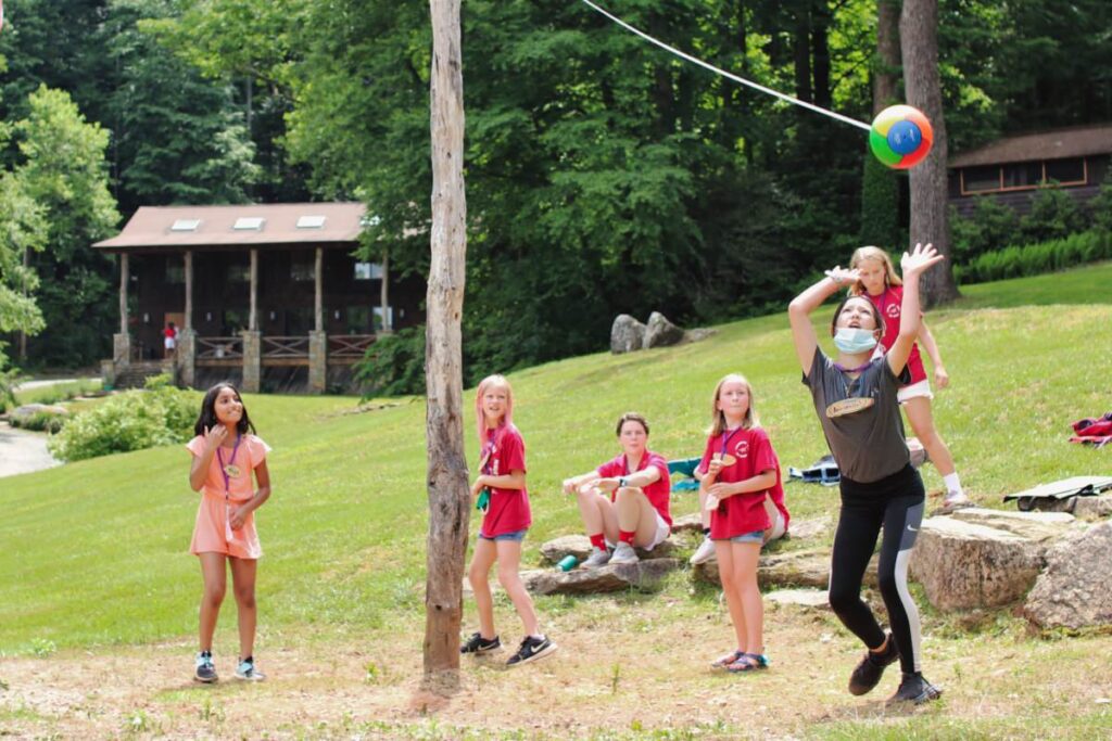 camp kids playing tetherball