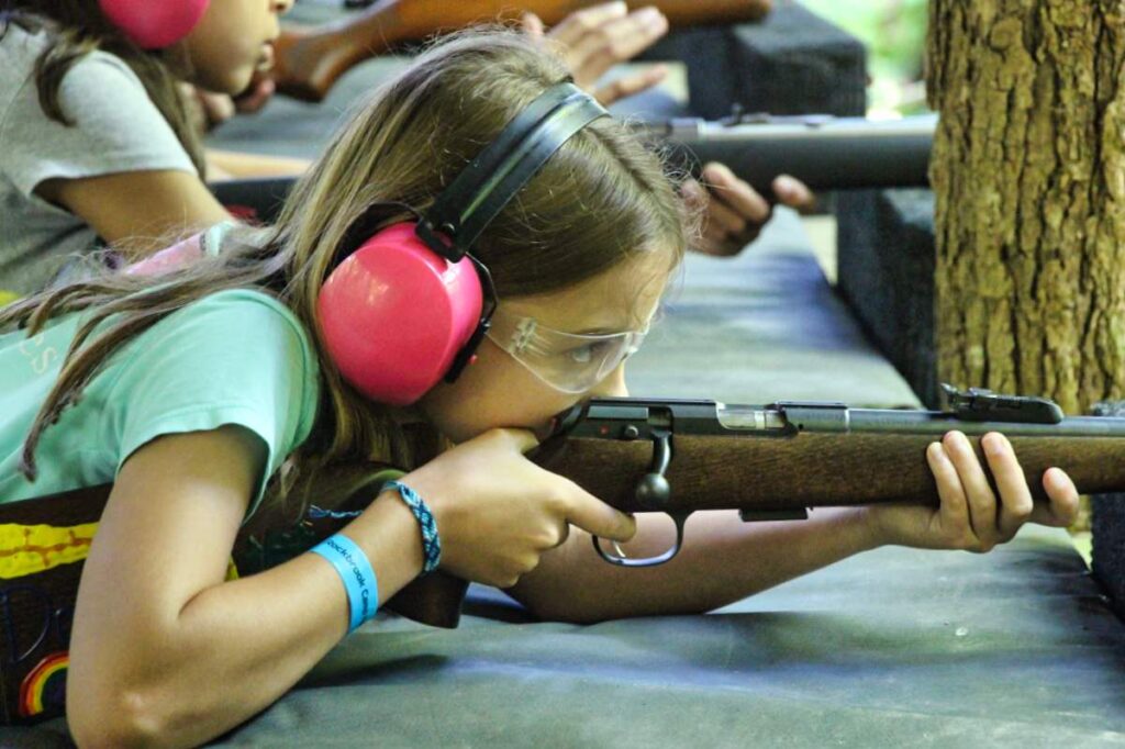 tiny camp girl shooting rifle