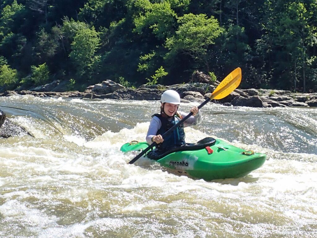 camp girl kayaking