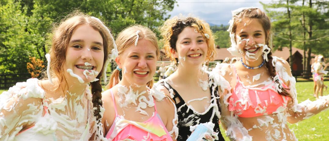 camp girls covered in shaving cream