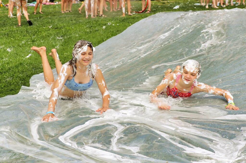 girls camp slip and slide fun