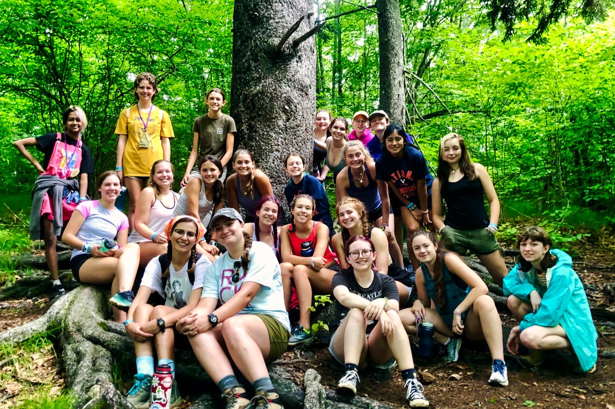 Teenager hiking camp group