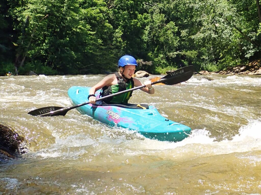 camp girl kayaking