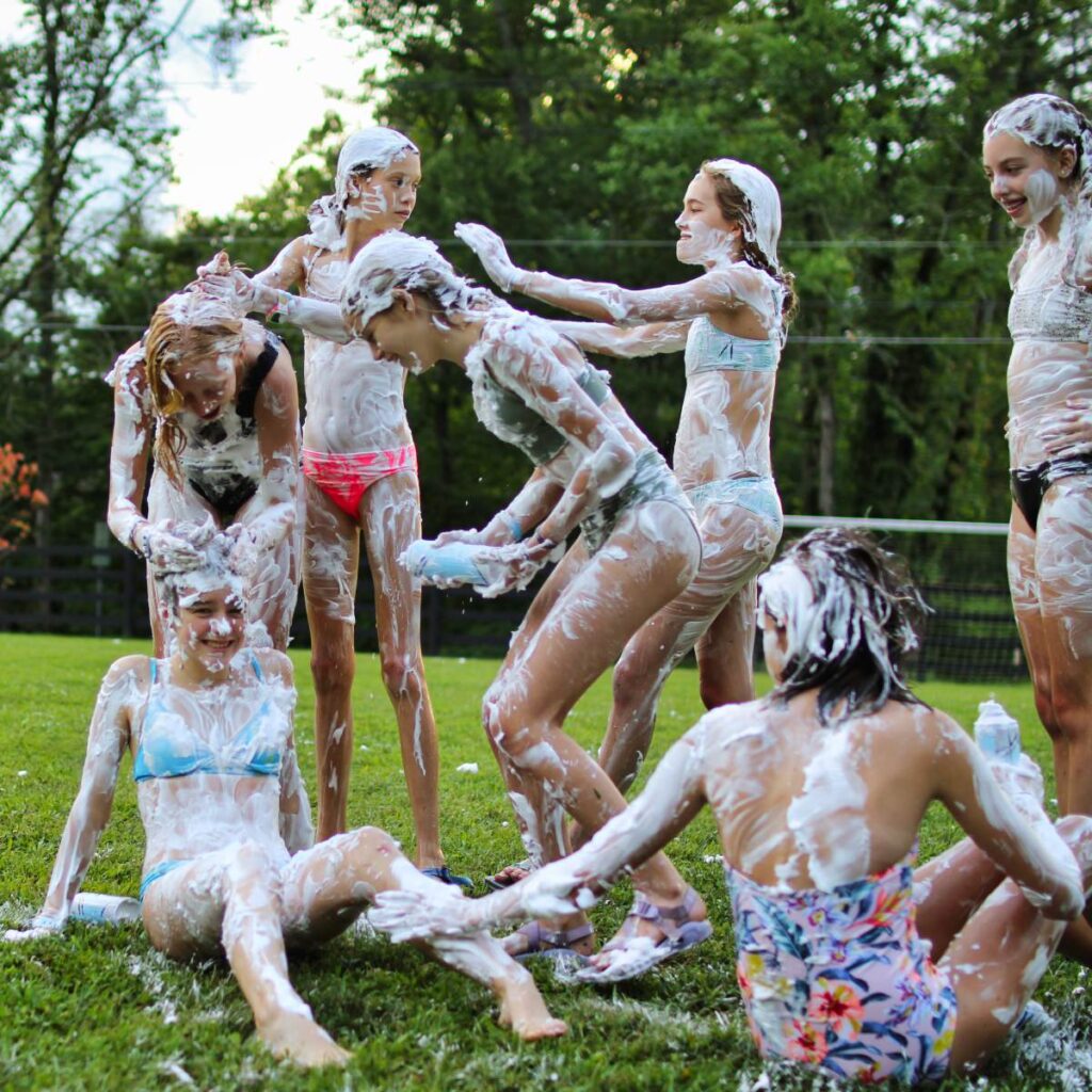 group of shaving cream fight girls