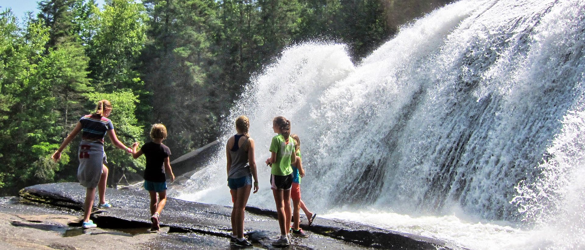 summer camp waterfall hike with kids