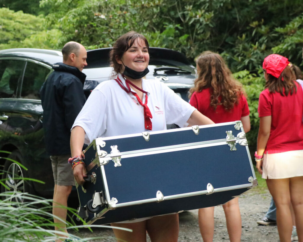 carrying trunk on camp move in day