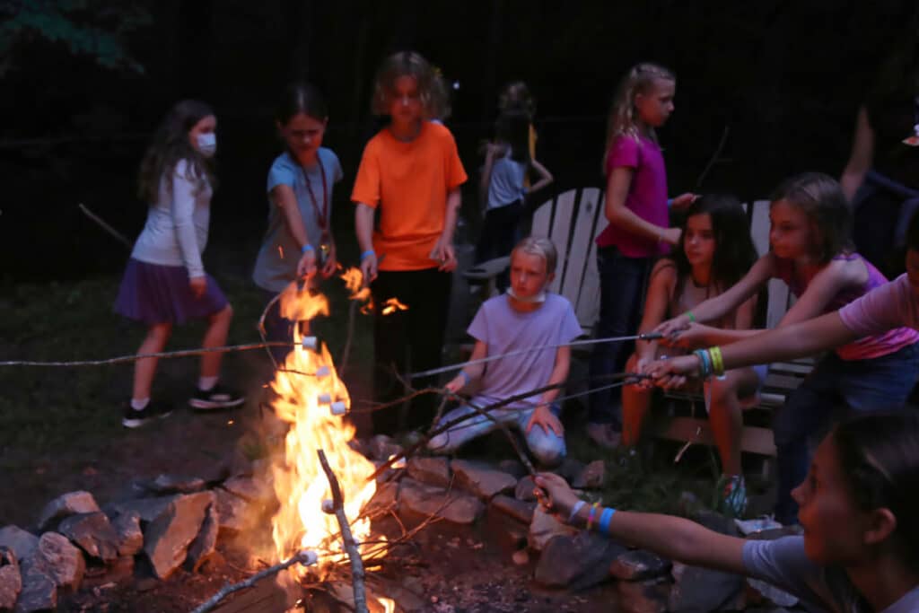 camp campfire roasting marshmellows