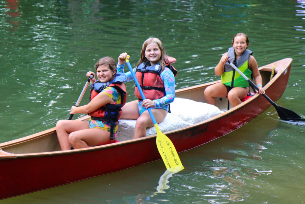 summer camp learning canoeing